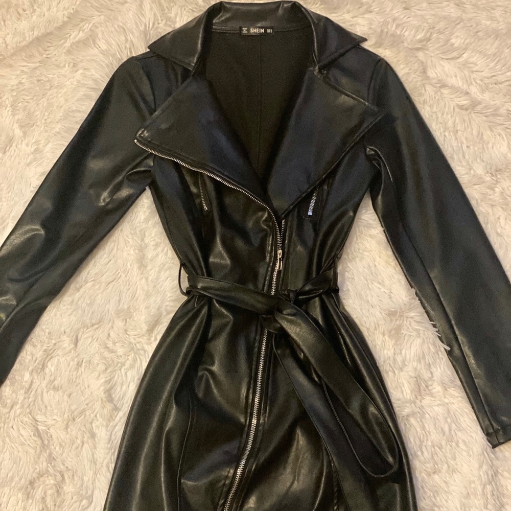Leather Jacket with Zipper Detailing and adjustable tie waste.
